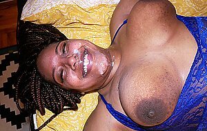 Chubby ebony MILF in blue lingerie sucks and fucks a white dick on the bed